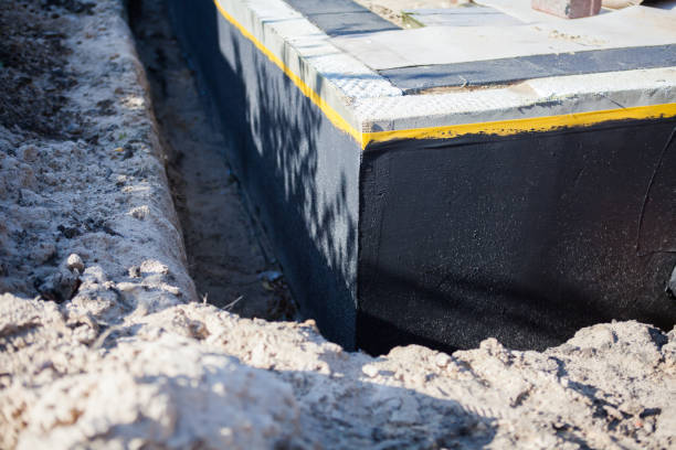 Professional Waterproofing technician working in Maysville, GA